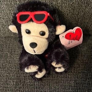Adorable Black and Cream Stuffed Monkey with Red Sunglasses